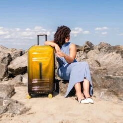 Delsey Rempart Translucent Medium Trunk Expandable Spinner 3 Delsey Rempart Translucent Medium Trunk Expandable Spinner -Luggage Pros Shop Delsey Rempart Translucent Medium Trunk Expandable Spinner 2